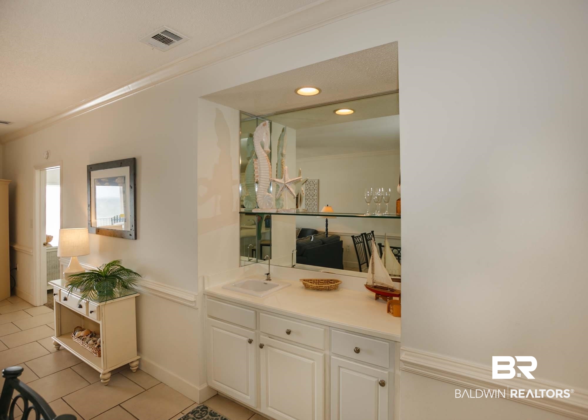 28910 Perdido Beach Boulevard, Unit 4B Orange Beach, AL 36561 - Photo 12 of 48 Bathroom featuring tile patterned floors, vanity, crown molding, and visible vents
