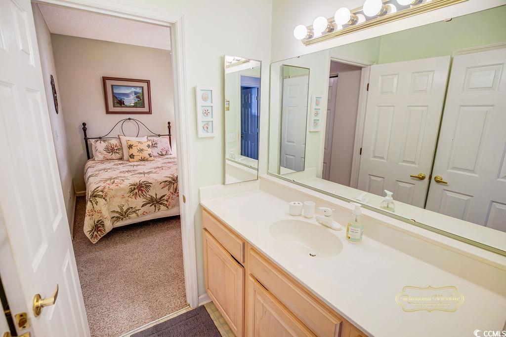 2203 Sweetwater Boulevard, Unit 2203 Murrells Inlet, SC 29576 - Photo 4 of 23 Bathroom with vanity