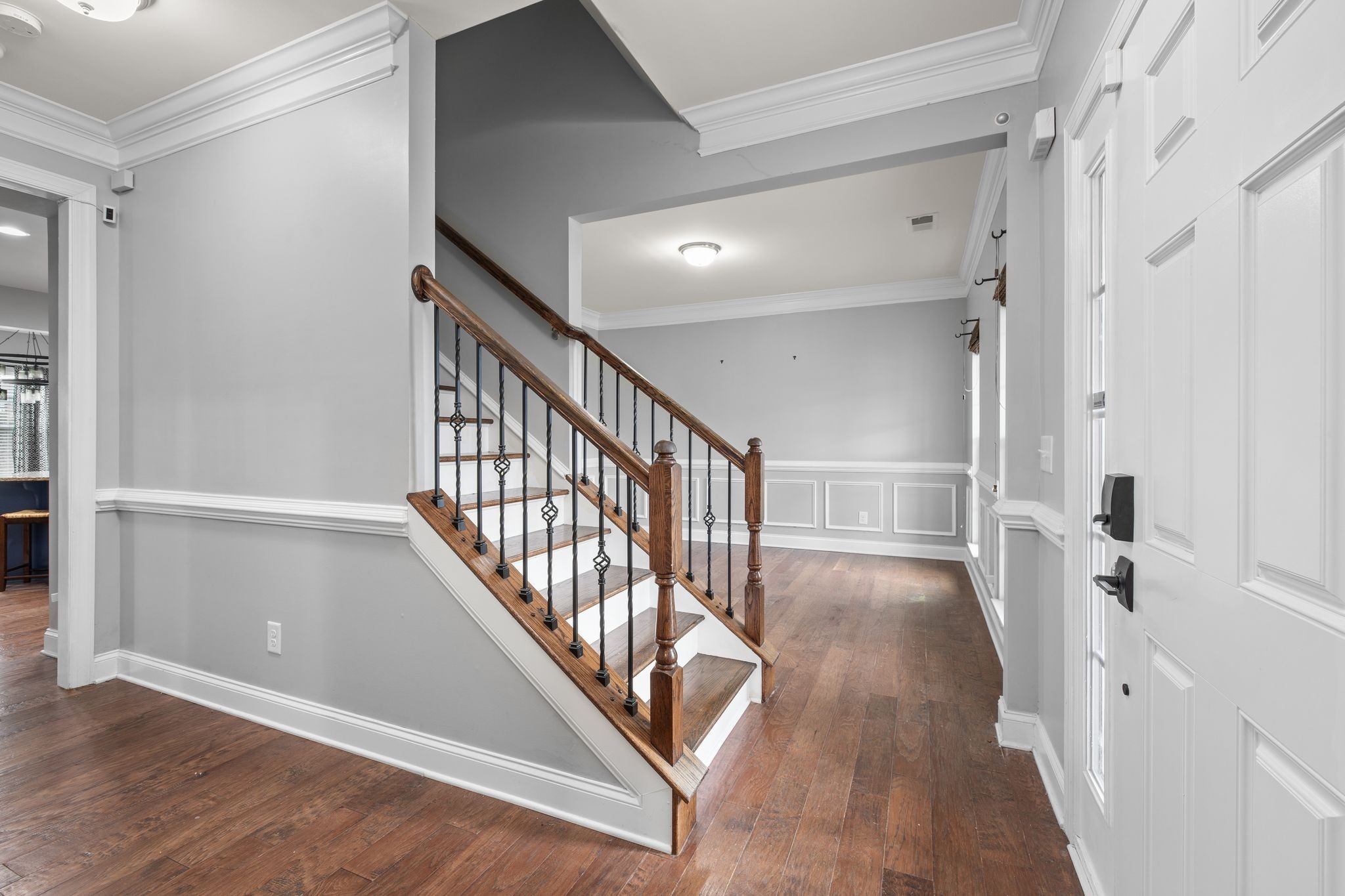 1931 Portview Drive Spring Hill, TN 37174 - Photo 16 of 51 a view of a hallway with wooden floor and staircase