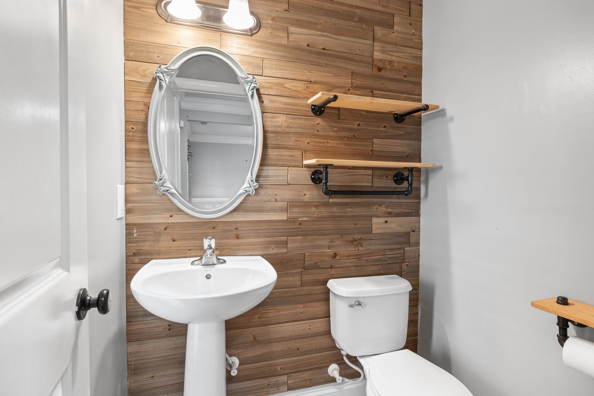 1931 Portview Drive Spring Hill, TN 37174 - Photo 18 of 51 a bathroom with a toilet sink and mirror