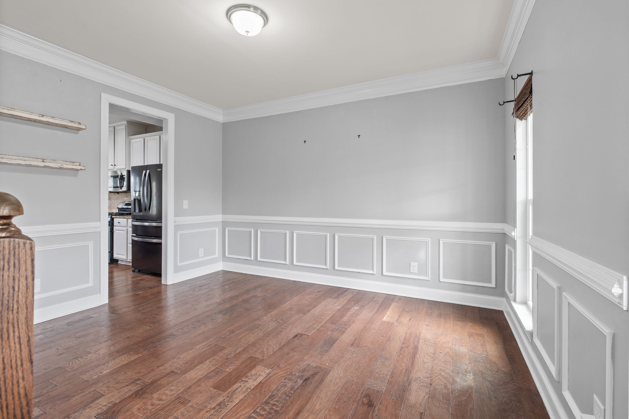 1931 Portview Drive Spring Hill, TN 37174 - Photo 19 of 51 a view of an empty room with wooden floor and a window