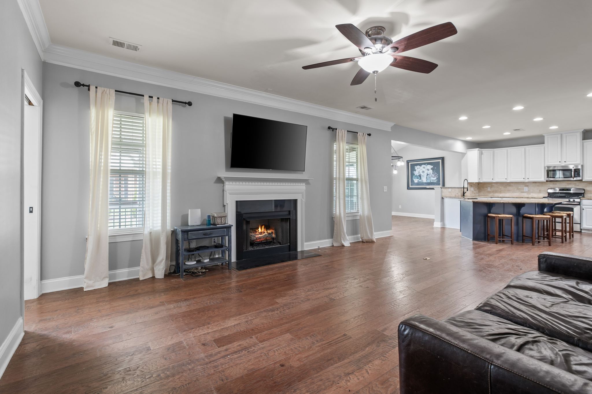 1931 Portview Drive Spring Hill, TN 37174 - Photo 26 of 51 a living room with furniture and a fireplace