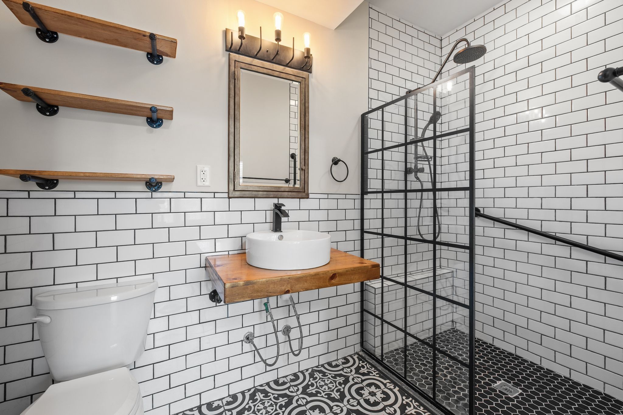 1931 Portview Drive Spring Hill, TN 37174 - Photo 29 of 51 a bathroom with a sink toilet and shower