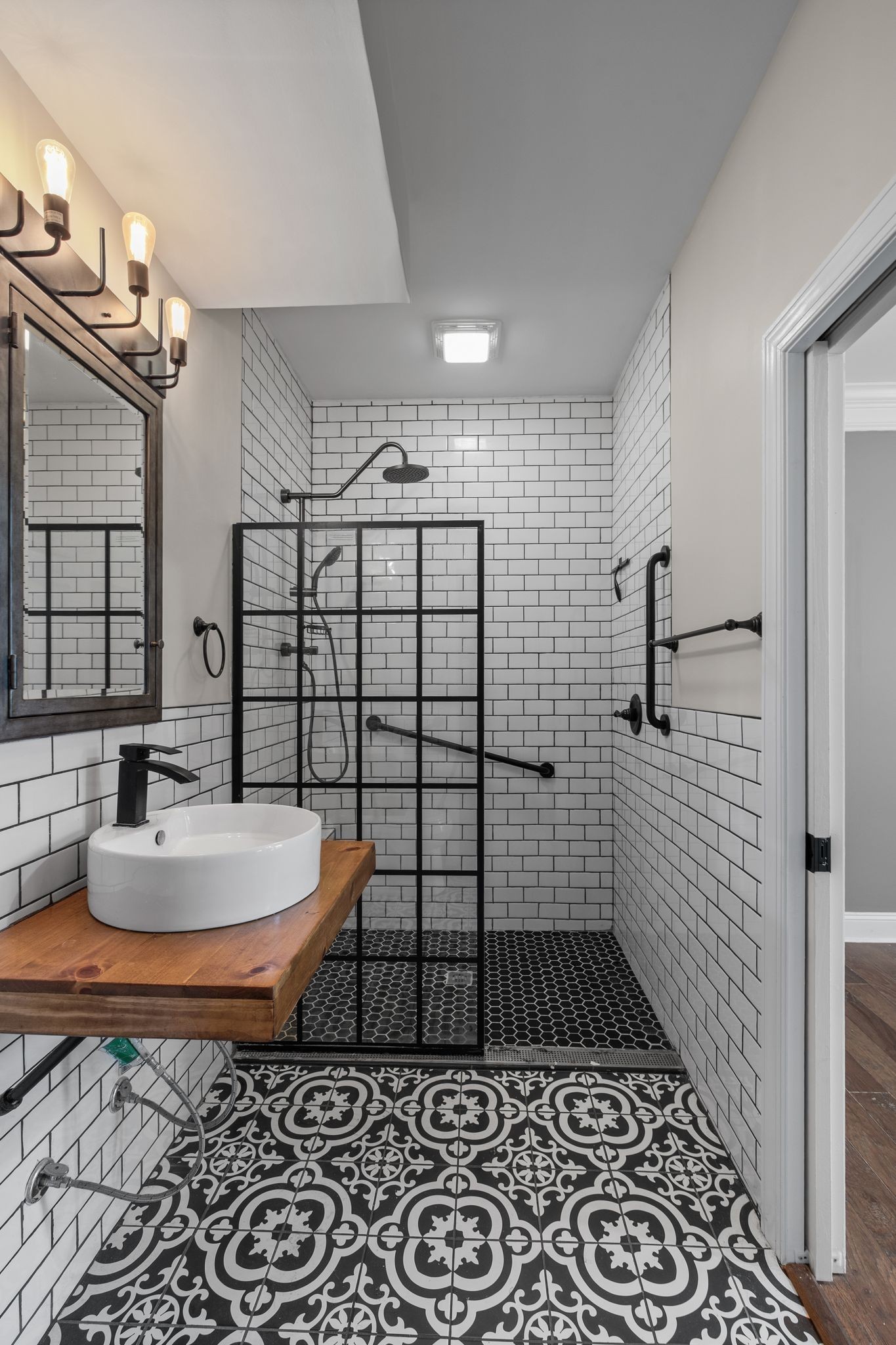 1931 Portview Drive Spring Hill, TN 37174 - Photo 30 of 51 a bathroom with a sink toilet and shower