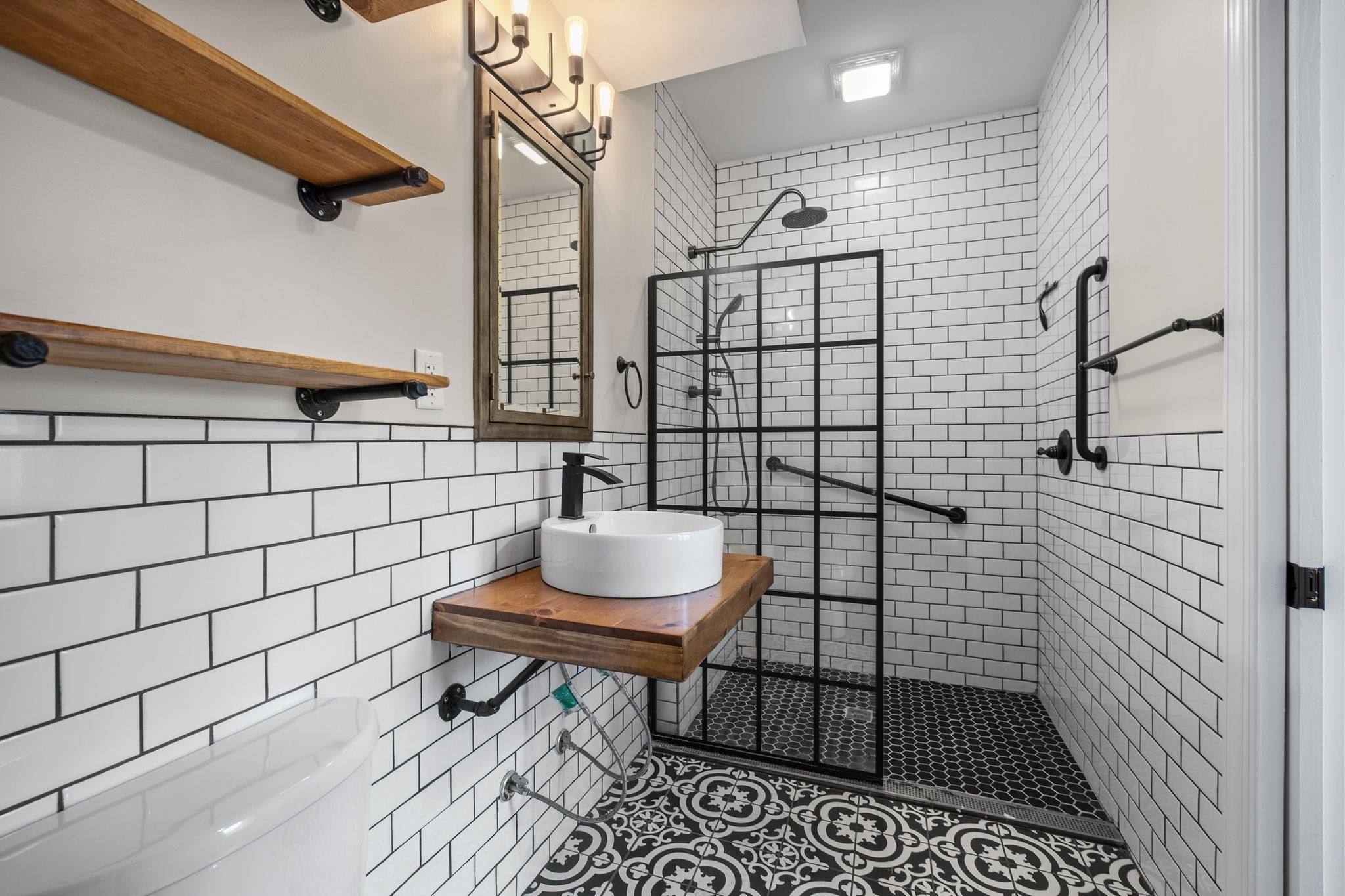 1931 Portview Drive Spring Hill, TN 37174 - Photo 31 of 51 a bathroom with a sink and a shower