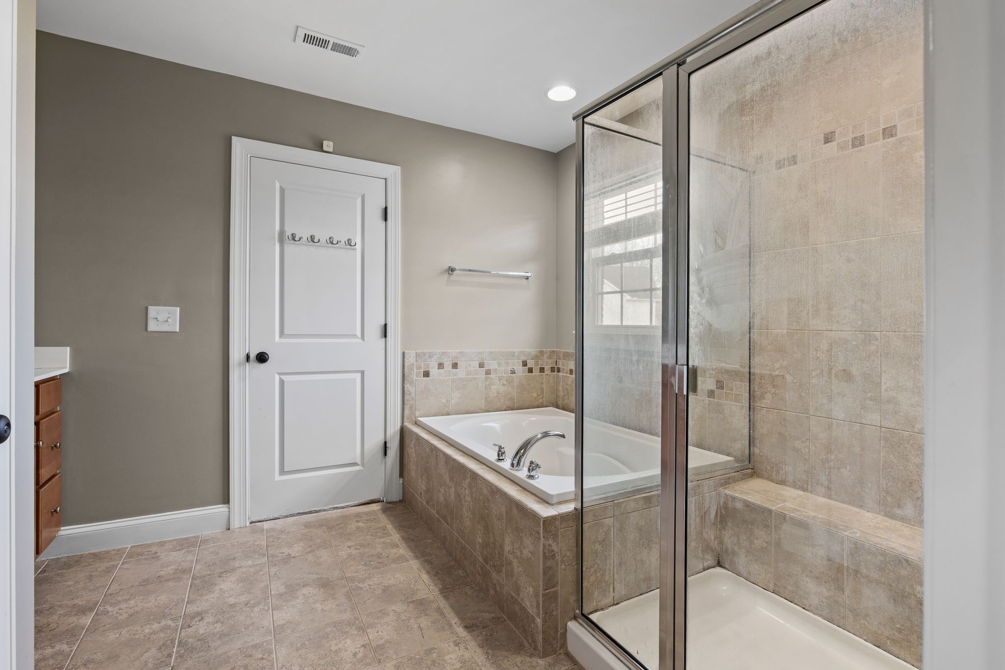 1931 Portview Drive Spring Hill, TN 37174 - Photo 35 of 51 a bathroom with a tub shower and sink