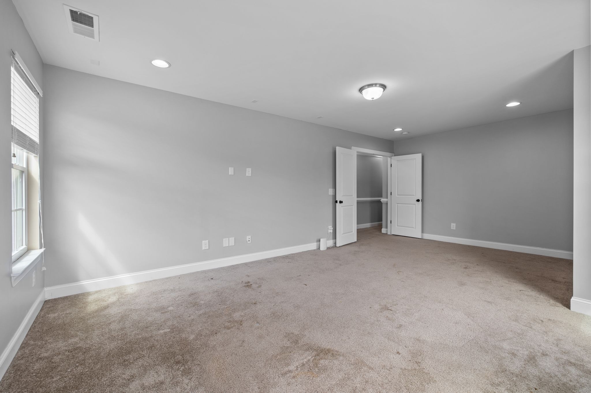 1931 Portview Drive Spring Hill, TN 37174 - Photo 41 of 51 an empty room with windows and pillars in it