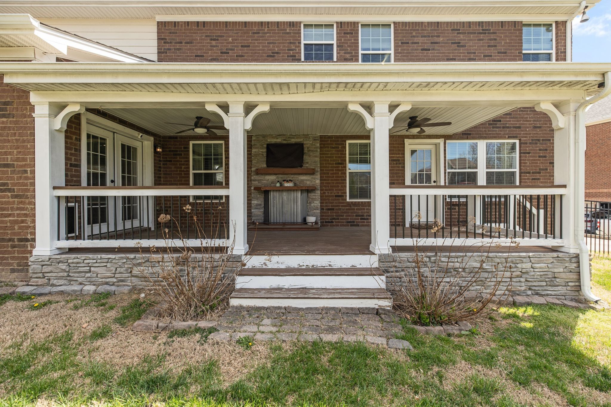 1931 Portview Drive Spring Hill, TN 37174 - Photo 44 of 51 a view of a brick house with large windows