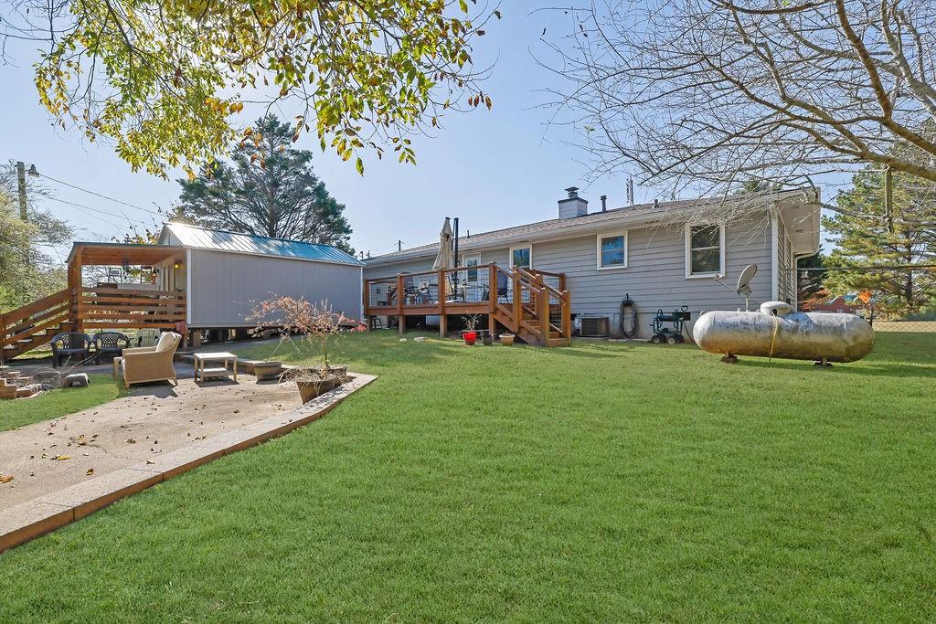 7618 Vaughn Road Woodstock, GA 30188 - Photo 38 of 44 a view of a house with backyard