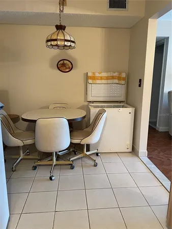 a living room with a couch and a table