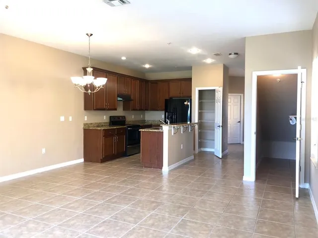 a kitchen with a stove and a microwave