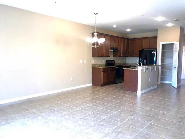 a bathroom with a sink and a large mirror