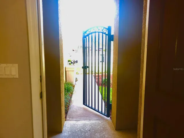 a view of entryway and hall with a window