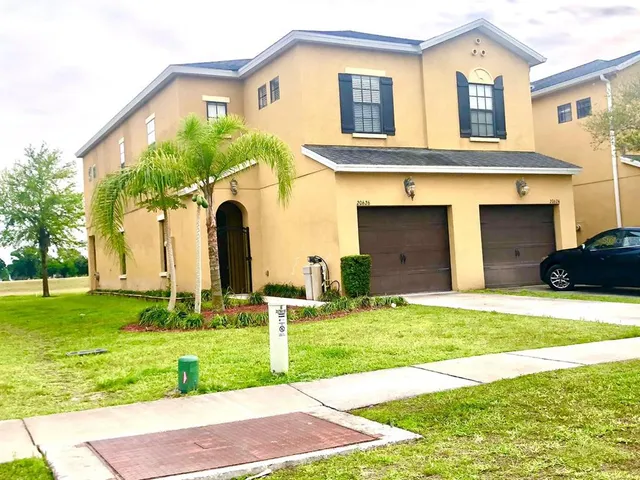 a white bath tub sitting in a bathroom
