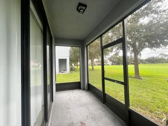 a view of room with ceiling fan