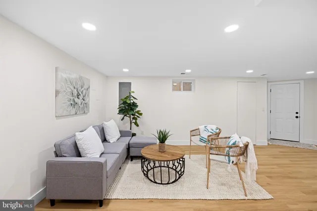 a living room with furniture and a table