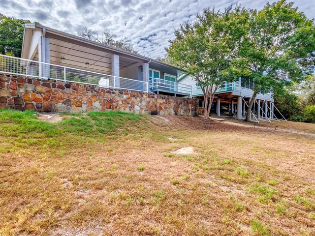 front view of a house with a big yard