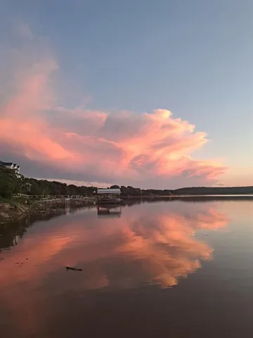 a view of outside space with a lake view