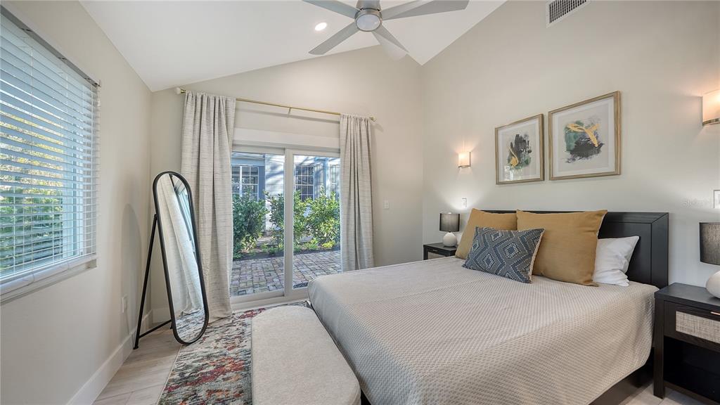 1901 Morrill Street Sarasota, FL 34236 - Photo 16 of 50 a bedroom with a bed and a large window