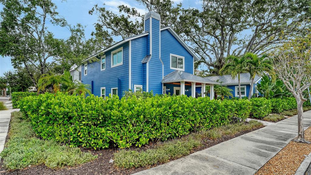 1901 Morrill Street Sarasota, FL 34236 - Photo 2 of 50 a front view of a house with a yard and trees