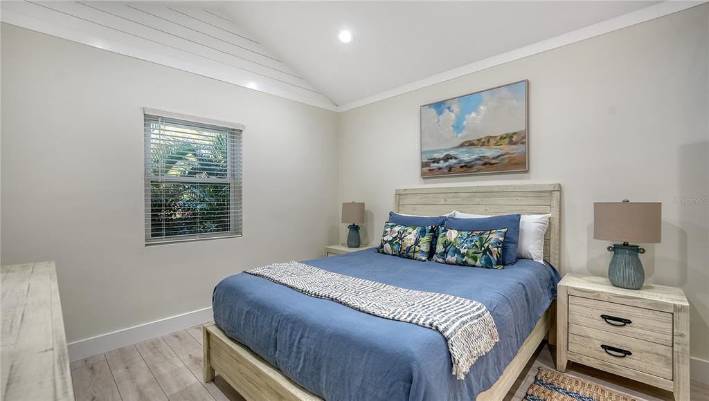 1901 Morrill Street Sarasota, FL 34236 - Photo 27 of 50 a bedroom with a bed and a painting on the wall