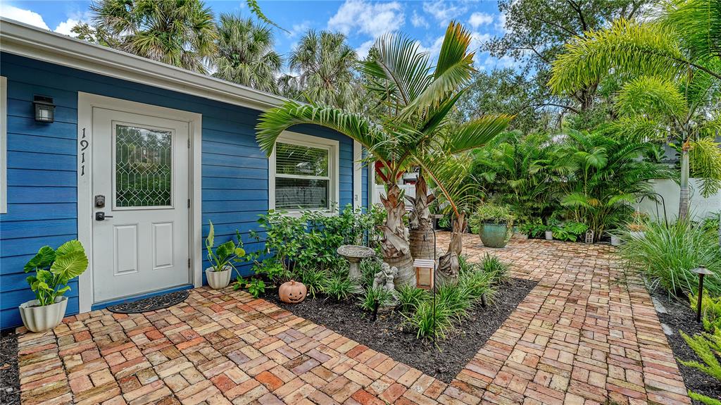 1901 Morrill Street Sarasota, FL 34236 - Photo 30 of 50 a view of backyard with potted plants and a bench