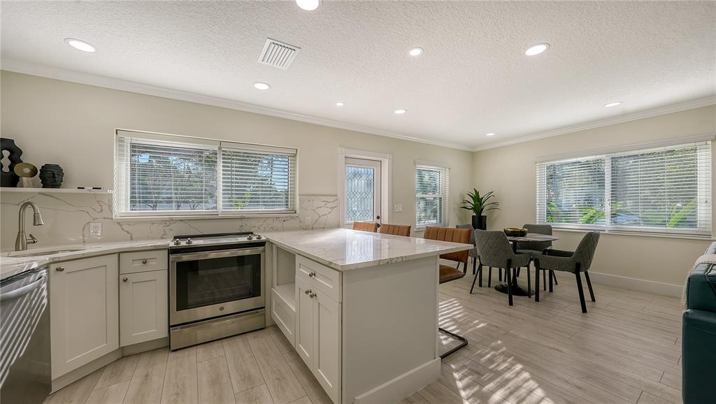1901 Morrill Street Sarasota, FL 34236 - Photo 38 of 50 a view of a kitchen counter top space with stainless steel appliances granite countertop furniture and a kitchen counter top space