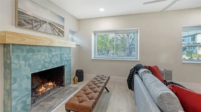 a view of a livingroom with furniture and a fireplace