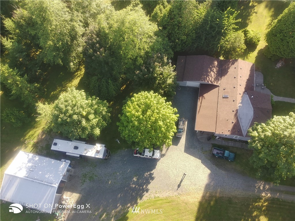 6618 Kickerville Road Ferndale, WA 98248 - Photo 1 of 30 an aerial view of a house with a yard basket ball court and outdoor seating