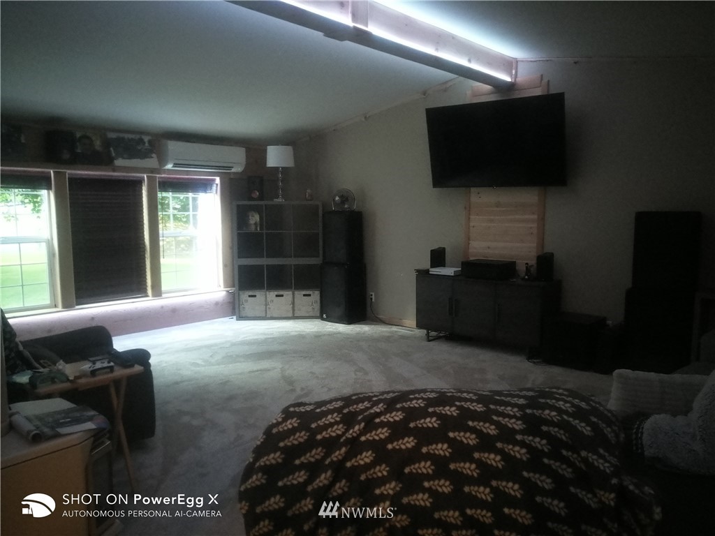 6618 Kickerville Road Ferndale, WA 98248 - Photo 13 of 30 a bedroom with a bed and a television in it