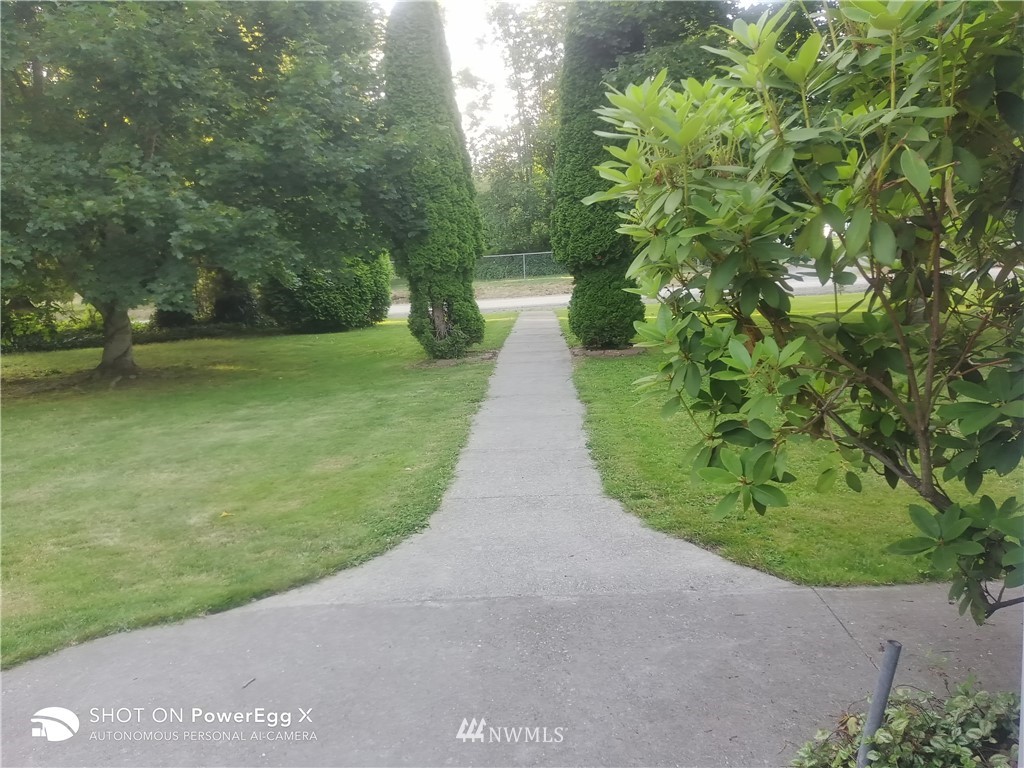 6618 Kickerville Road Ferndale, WA 98248 - Photo 14 of 30 a view of a pathway both side of garden