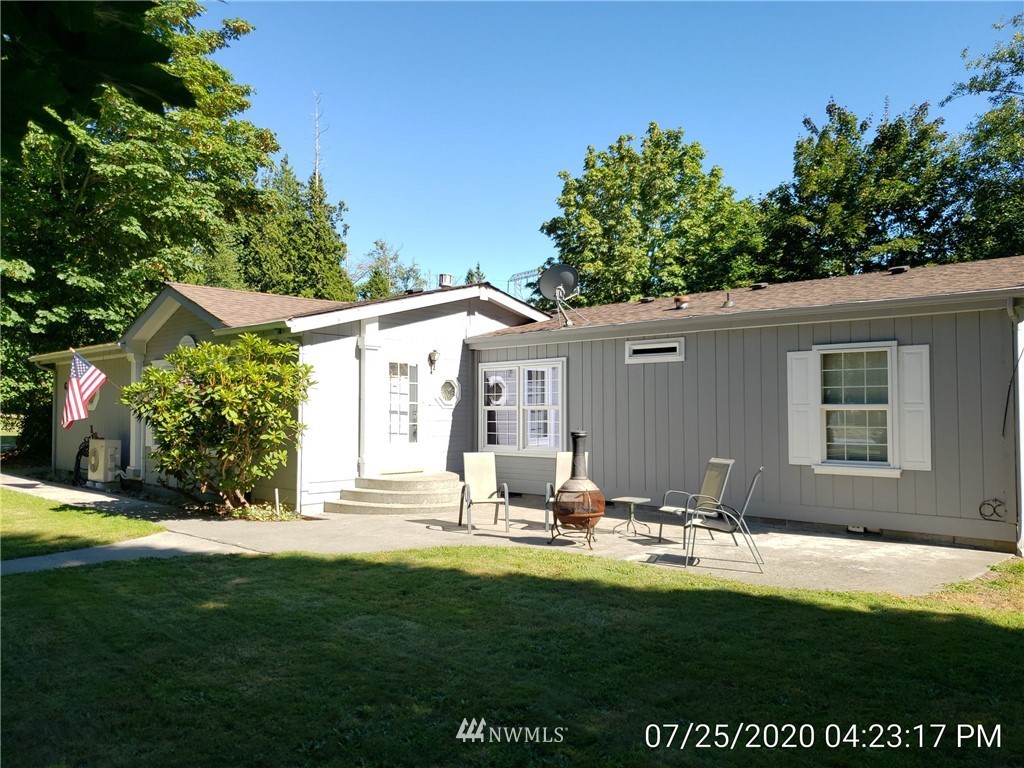 6618 Kickerville Road Ferndale, WA 98248 - Photo 24 of 30 a view front of house with backyard and outdoor seating
