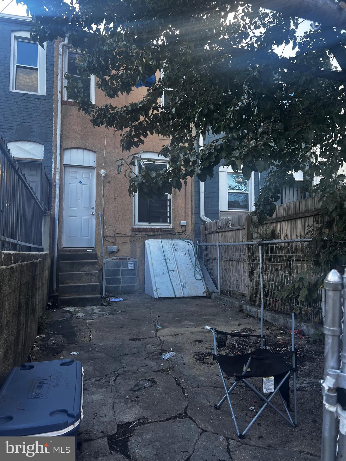 511 North Port Street Baltimore, MD 21205 - Photo 11 of 11 a view of a backyard with sitting area and tree