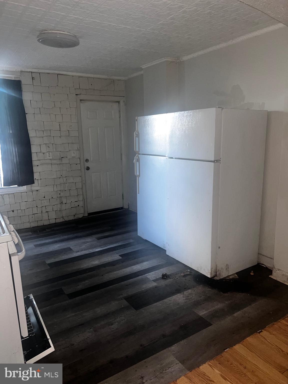 511 North Port Street Baltimore, MD 21205 - Photo 6 of 11 a view of a closet area with wooden floor