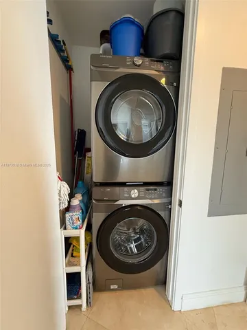 a view of a livingroom from fire place