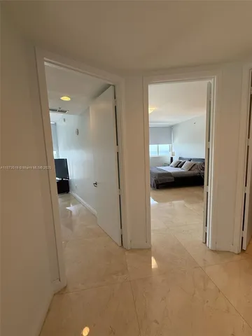 a view of a hallway view with staircase