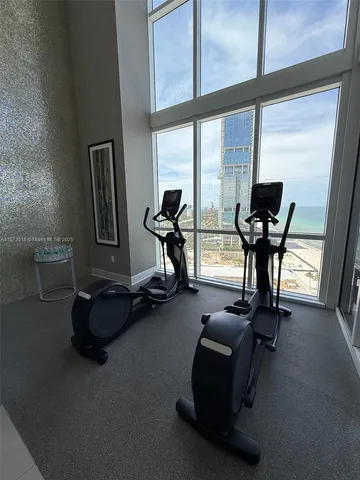 a view of a room with gym equipment