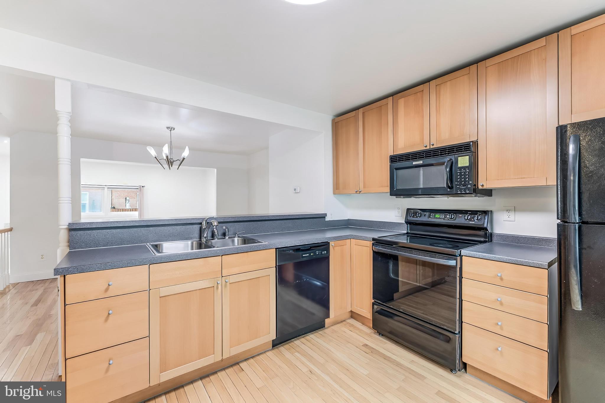 2331 Harleyford Court Reston, VA 20191 - Photo 6 of 40 Modern kitchen with sleek finishes.