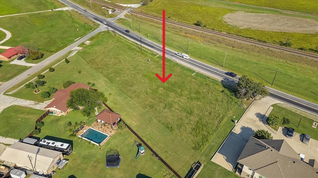 101 January Lane Ponder, TX 76259 - Photo 8 of 13 a view of a balcony with floor to ceiling windows with wooden floor