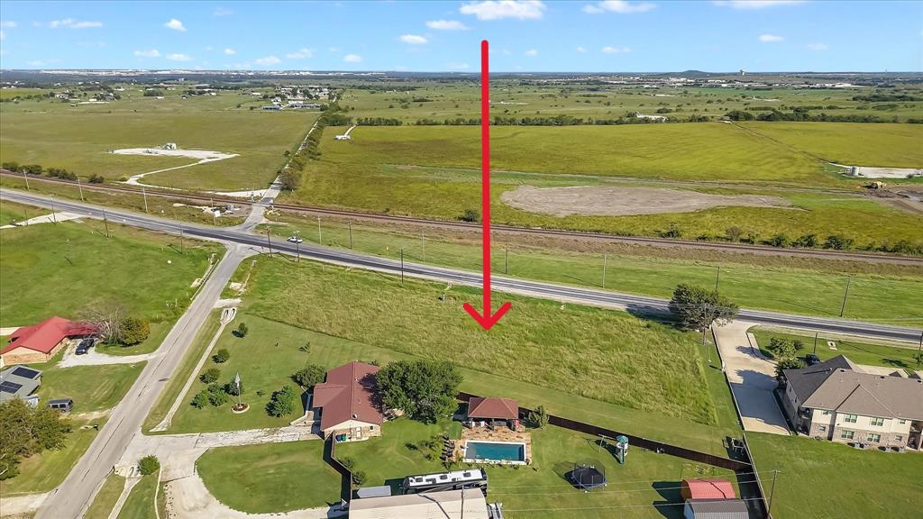 101 January Lane Ponder, TX 76259 - Photo 9 of 13 a view of an ocean and a building