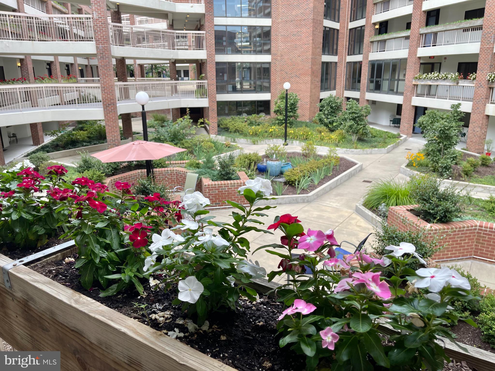 1951 Sagewood Lane, Unit 110 Reston, VA 20191 - Photo 3 of 41 Owner's Planters for Herbs or Blooms