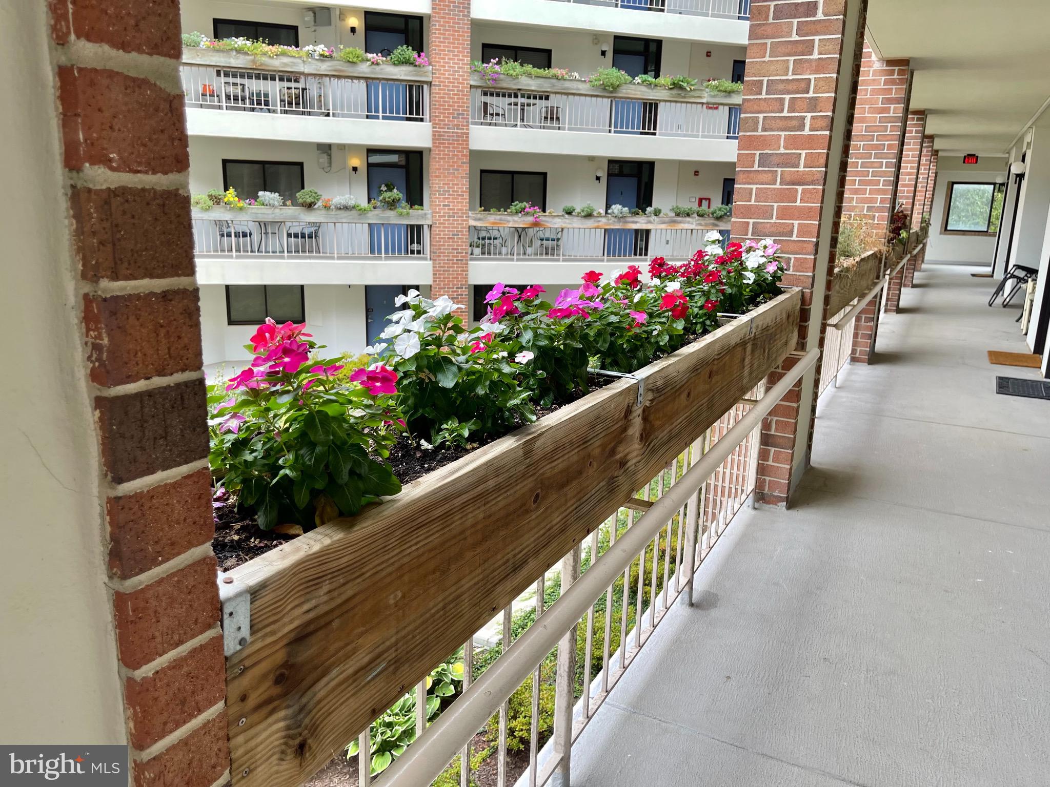 1951 Sagewood Lane, Unit 110 Reston, VA 20191 - Photo 4 of 41 Covered Walkways - Wonderful Outdoor Space!
