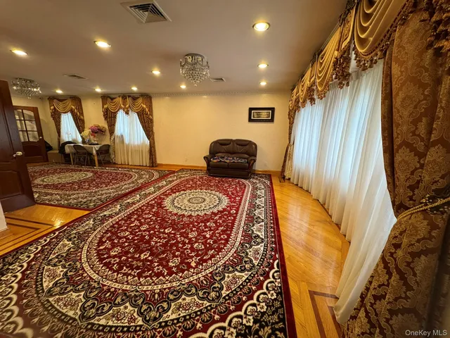 a living room with a rug