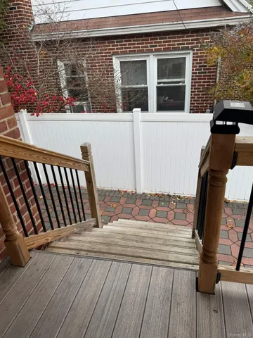 a view of a yard and a chair