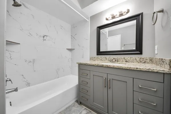 a bathroom with a sink and a toilet