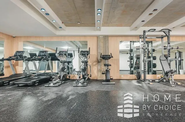 a view of a room with gym equipment
