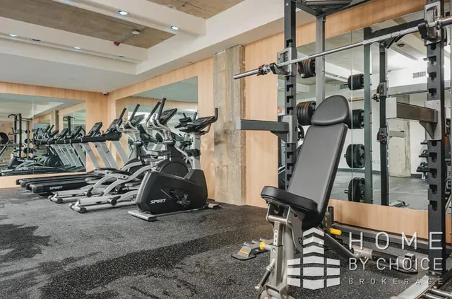 a view of a room with gym equipment
