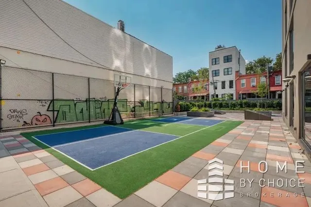 a view of a building with a yard