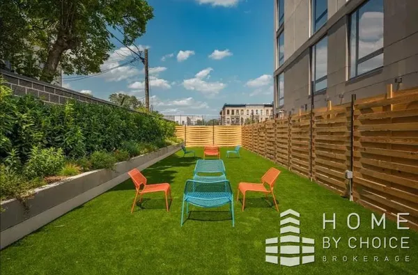 a garden view with a sitting space