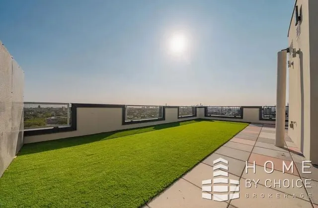 a bathroom with a tub shower and sink